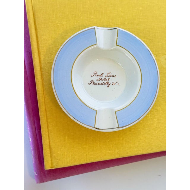 Fun lilac painted porcelain ashtray trinket or ring dish with a bright citron stripe, gilt trim, and whimsical handpainted...