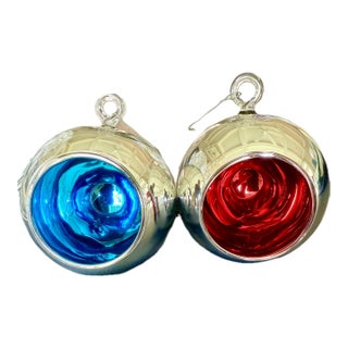 Large Pair of Hand-Blown Glass Ornaments by Two’s Company in Red and Blue With Silver Finish — 10" Diameter For Sale