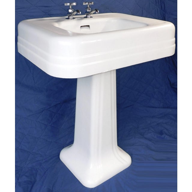 This piece is in nice condition for its age, with gleaming white porcelain top to bottom. The majority of the blemishes...
