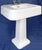 This piece is in nice condition for its age, with gleaming white porcelain top to bottom. The majority of the blemishes...