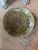 A large ceramic platter crafted in Japan during the 20th century. In style of Mashiko ware. Finished with a rich green...