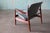 An early France lounge chair in teak and wool, model 136 designed by Finn Juhl for France and Daverkosen c. 1950s. Early...