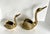 This charming pair of later mid-century brass swans brings a touch of classic Hollywood Regency glam and whimsy to any...