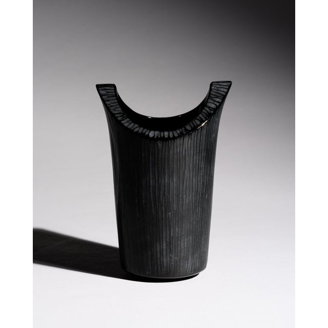Asymmetrical black art glass vase designed by Claus Josef Riedel for Riedel, Austria, during the 1970s–1980s. The vase has...