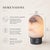 Bring natural beauty and cordless convenience to your home with this rechargeable table lamp crafted from genuine Spanish...