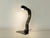Elegant COBRA desk lamp by Kisho Kurokawa for Yamagiwa from the 1970s. Black painted metal base with a flexible, plastic-...