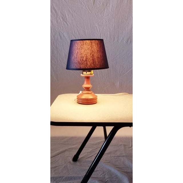 Cute pair of vintage table lamps. Both marked. Would work perfect as bedside table lamps. Or in a hallway. This piece has...