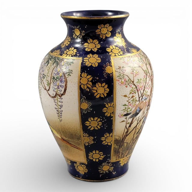Meiji-period Kyoto Satsuma vase by the Kinkozan workshop, circa 1895, executed in a bold cobalt-blue ground with rich...