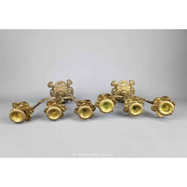Pair of French Gilt Bronze Candelabras, c. mid-late 1800s These elegant candelabras are made from gilt bronze in style of...