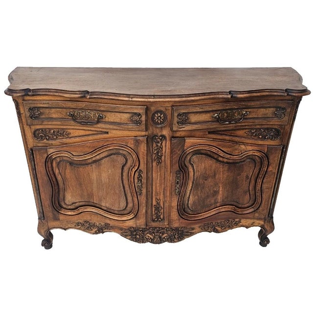 Bring timeless European elegance into your home with this stunning Antique French Louis XV walnut buffet sideboard,...