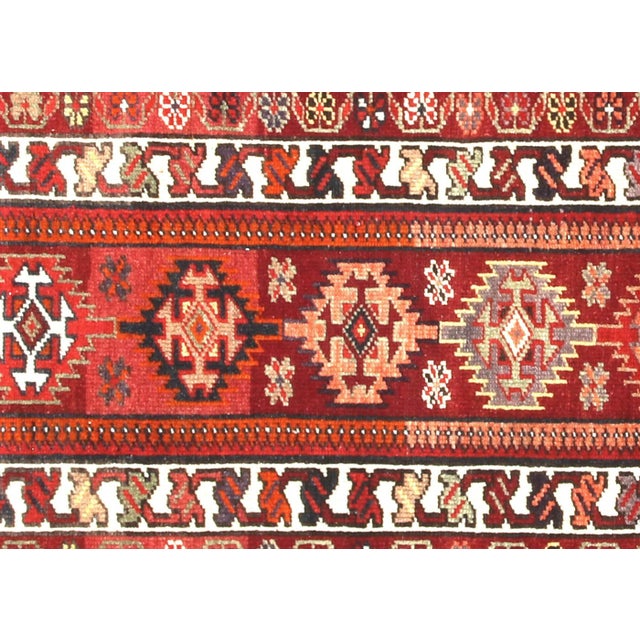 Handwoven vintage Turkish Oushak runner measuring 2'10" x 14'. Crafted with wool on wool foundation in Western Turkey's...