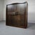 Brutalist bar cabinet with two doors, several shelves, 3 drawers and an illuminated bar area. The doors have beautiful...