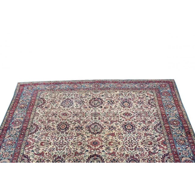 This antique Persian rug from 1920s is hand-knotted and made from 100% wool. There is no better way to add some warmth and...