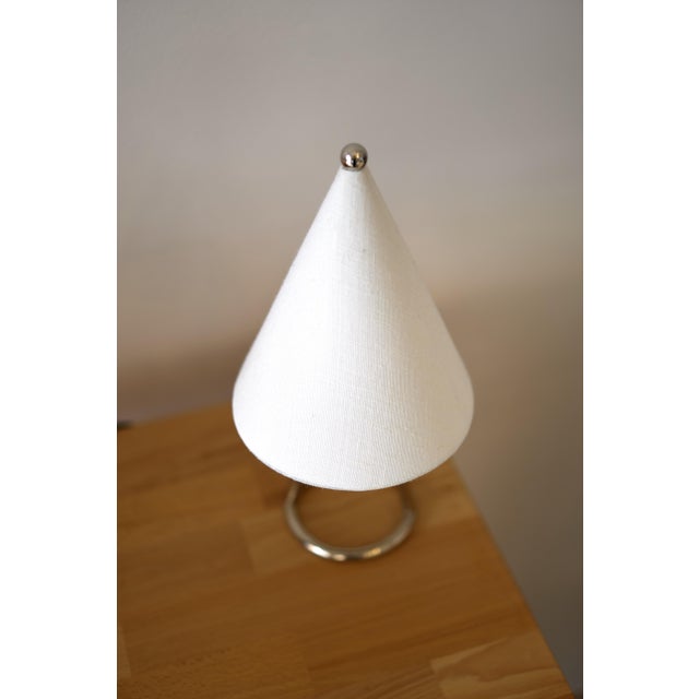 Andorra, Contemporary style Table Lamp, Iron, Black oxidised and lacquered brass, Linen, D115xH300mm, 1xG9 This piece has...