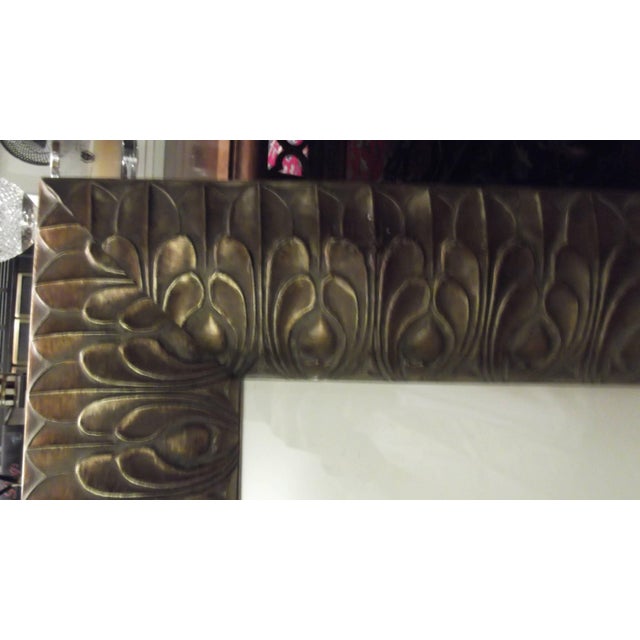 A set of hand colored prints with gilt highlights of neoclassic urns. Elaborate Egyptian Revival frames with a bronze...
