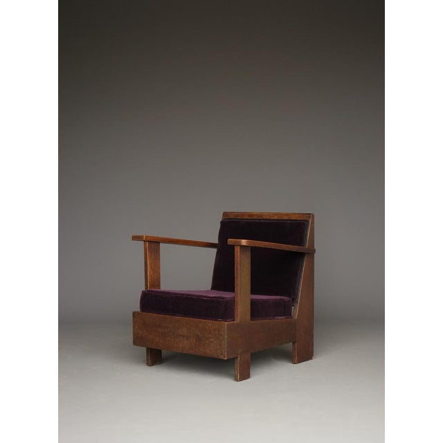 A lovely and little low armchair that we believe was designed as a lady chair .It is unusual in that it has particularly...