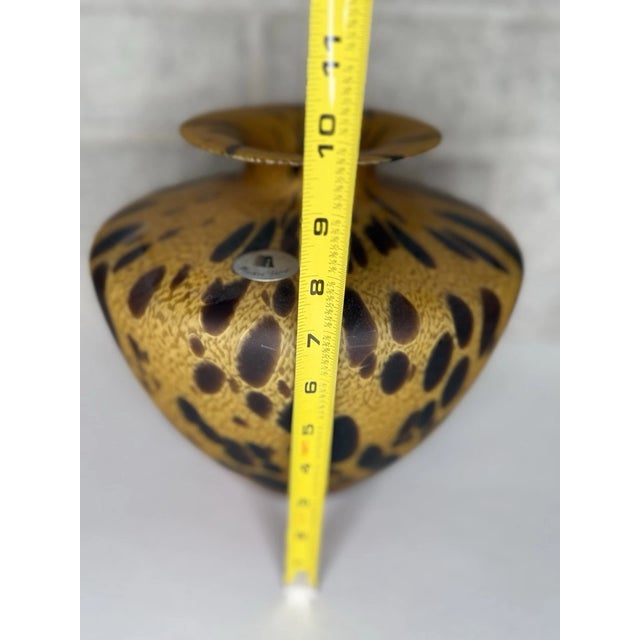 Beautiful Italian art glass vase crafted by skilled Maestri Vetrai (master glassmakers). This hand-blown piece features a...