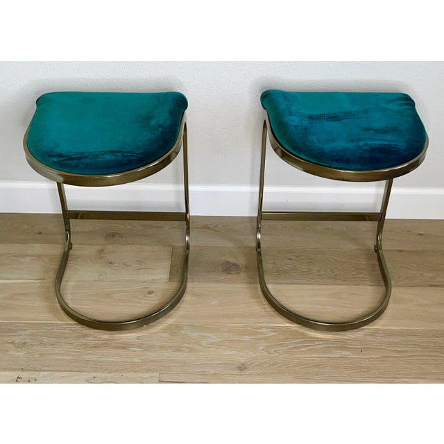 Chic set of stools manufactured in the late 1980's by well known maker, Cal-Style. Teal velvet covered seat with a...