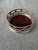 Vintage silver plate wine coaster with a fine ornate draped open design along the side and a faux tortoise base. Good...