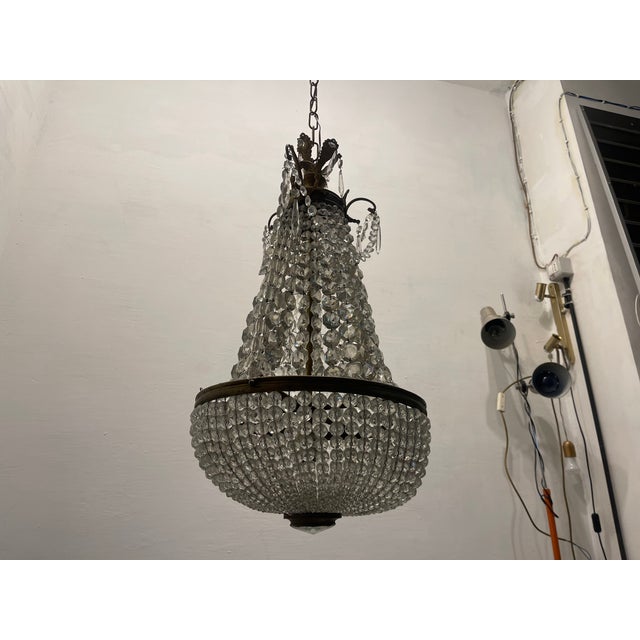 Bronze Crystal Basket Chandelier, 1940s, in Good conditions. Designed 1920 to 1949 Up to 250V (Europe/UK Standard).The...