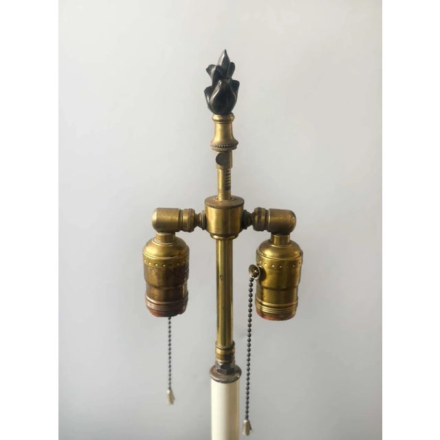 Pair of French 19th Century Empire Style bronze candelabras converted to table lamps, having D'ore bronze and dark patina....