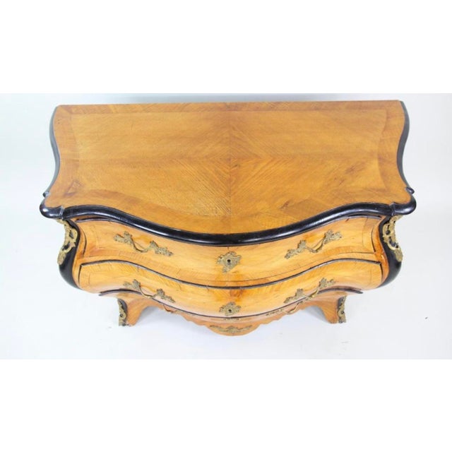Swedish Rococo Gilt Bronze Mounted Parquetry Commode. Nice vibrant woods with fancy gilt bronze decorations. Dimensions...
