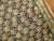 Finely woven early 20th century handmade Kuba rug in easy-going earthy palette.
