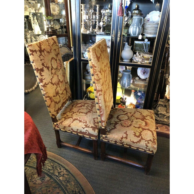 Pair of High Back English Upholstered Fireside Chairs Circa Late 17th to Early 18th Century. Re conditioned and...