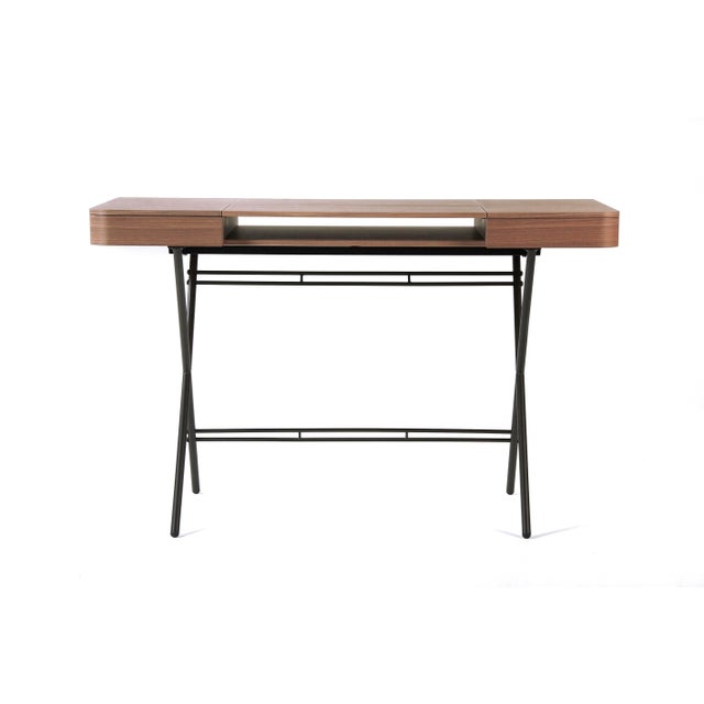 The Cosimo desk was designed by the architect Marco Zanuso Jr for luxury French furniture brand, Adentro Paris. The...