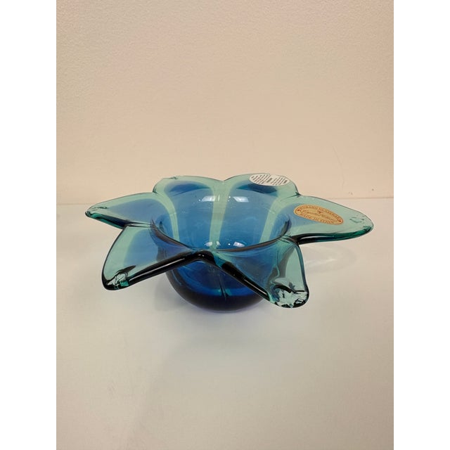 Pair of Murano glass votive holders, made in Italy. Flower or star-shaped style. Original stickers showing Italy origin....