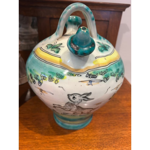 Mid 20th Century Hand Painted Spanish ceramic Botijo with two spouts and a handle. Traditional vessel to hold water...
