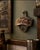 A classic vintage Coca-Cola “Drink Coca-Cola” STARR X wall-mounted bottle opener, rendered in cast metal with remnants of...
