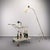 Stylish 1950s serving trolley Manufacturer likely Vereinigte Werkstätten München Metal frame with removable perforated...
