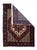 This west Persian village scatter with the characteristic navy octofoil and cartouche border, is in the typical Heriz...