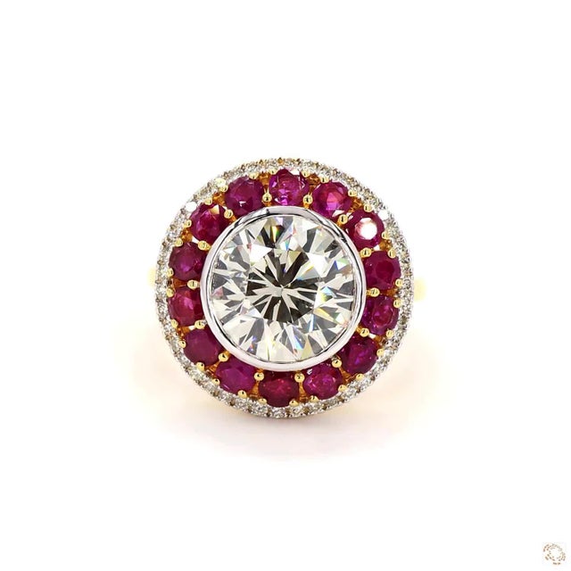 This ring from our contemporary estate collection centers on a 3.79-carat diamond in a round brilliant cut for lively,...