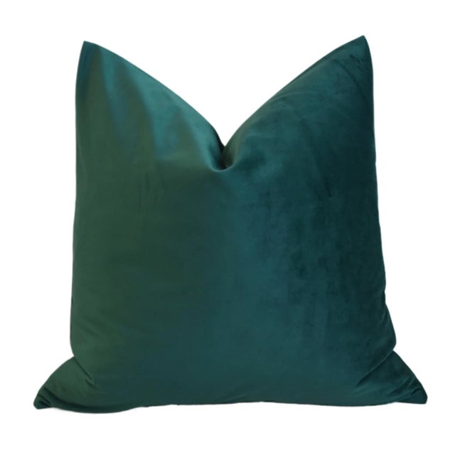 Pair of custom-tailored pillows in a solid emerald green-colored velvet. Same fabric on the back. Zipper closures. New...