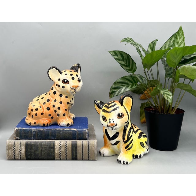 Charming vintage pair of hand-painted ceramic big cat cub figurines by Shafford Japan, featuring a spotted leopard and...