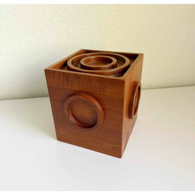 Mid-century modern 1960s teak ice bucket designed by Jens Quistgaard for Dansk. Solid teak construction with thick carved...