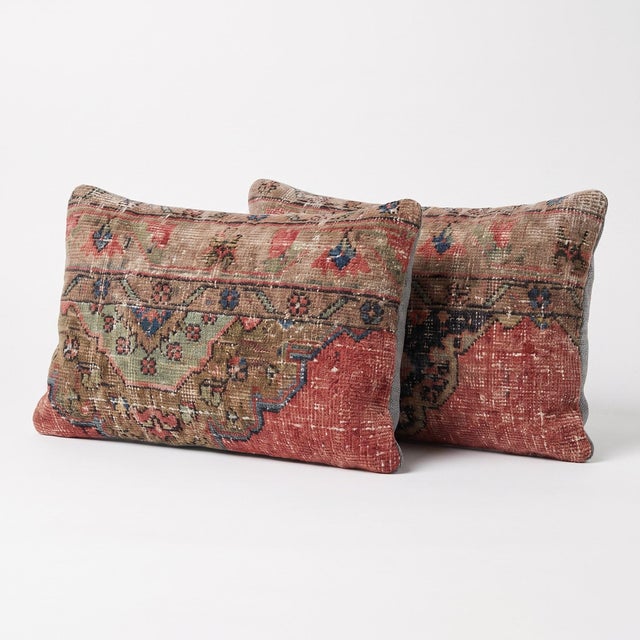 This beautiful 16'' x 24'' pillow cover set was made from authentic Turkish rug pieces. Bright colors of wool adorn the...