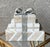 Excellent Pre-Owned Condition. Whimsical multi-tier tessellated travertine stone jewelry box, uniquely designed to look...
