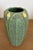 Jemerick Arts and Crafts Pottery vase, approximately 9 inches tall, with a matte green glaze, sculptural vertical leaf...