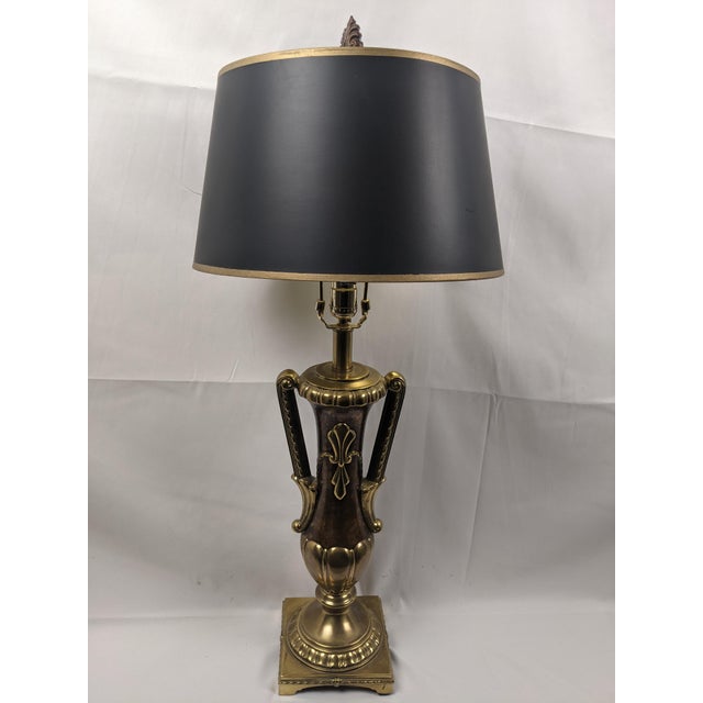 Elevate any interior with this substantial 34-inch neoclassical style table lamp, featuring an elegant urn-form body...