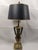 Elevate any interior with this substantial 34-inch neoclassical style table lamp, featuring an elegant urn-form body...