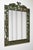 Large wrought iron mirror, partly hammered and green lacquered, decorated in the lower part with a mountain landscape, the...