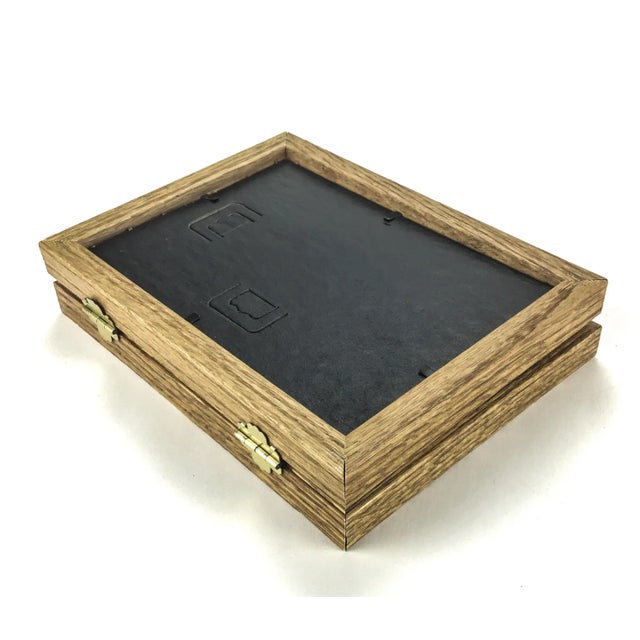 Very simple yet beautiful wood frame to hold 2 of your favorite 5 x 7 photos. The frame is held together by solid brass...