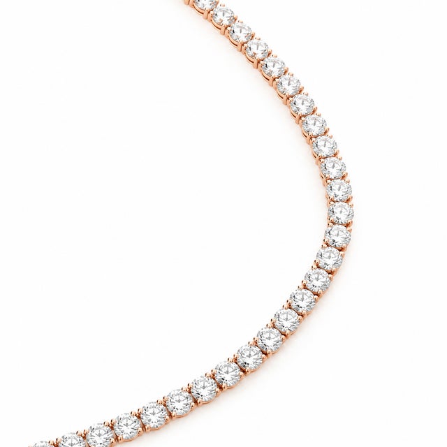 Timeless in form and dramatic in scale, this 10K Rose Gold tennis necklace is set with round CVD lab-grown diamonds in a...