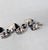 1950s silvertone scrolls with studs along the edges links with round domed spacers bracelet with spring ring clasp. Marked...