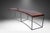 A handsome, sleek Modern curved console, sofa table / bench designed in the 1970's by Milo Baughman made by Thayer Coggin....