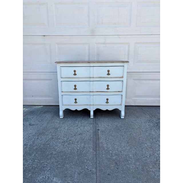 We have a beautiful vintage coastal farmhouse dresser for sale featuring a beautiful coastal blue painted finish, a warm...