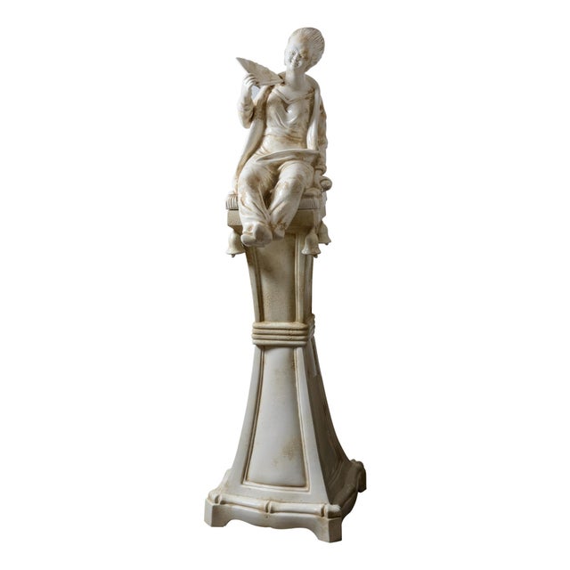 This is a pair of monumental 20th-century Italian white-glazed terracotta Chinoiserie statues. This striking, Hollywood...